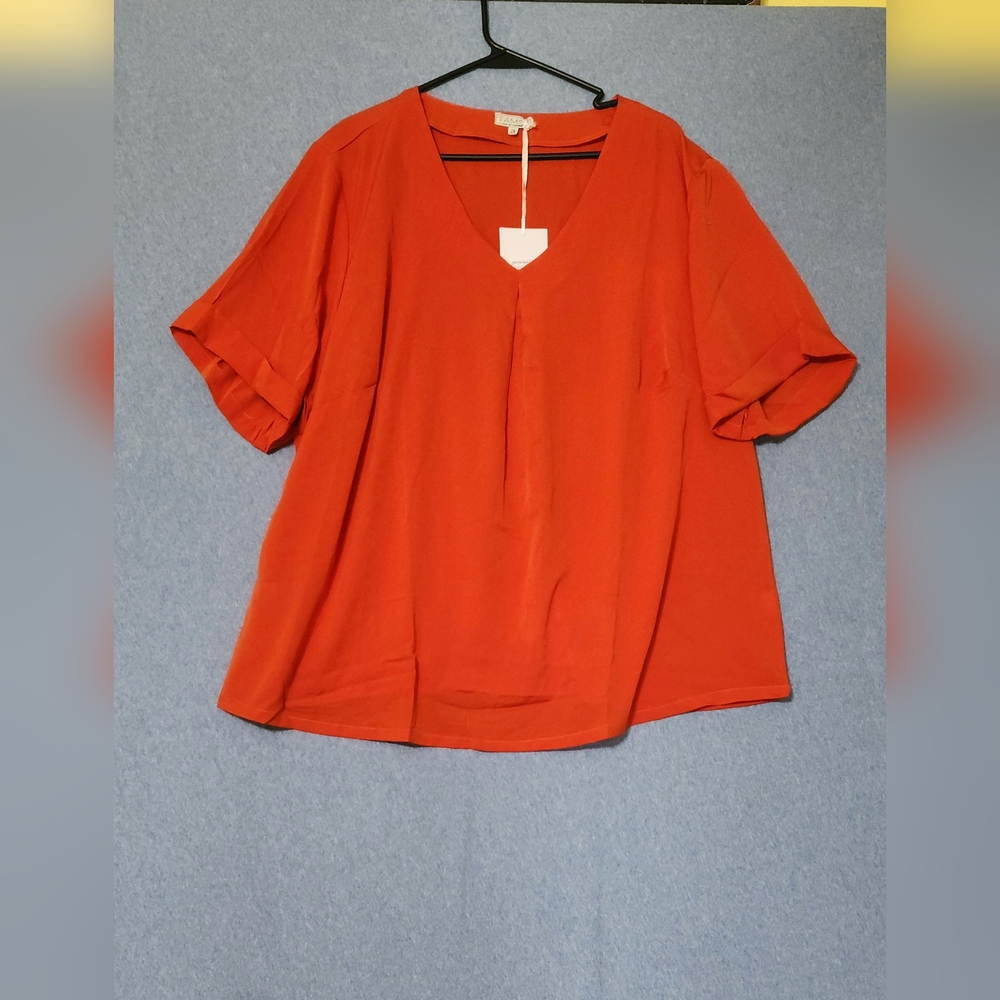Tamsy orange polyester short sleeved blouse. Size 2XL
